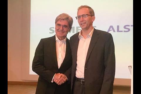 Siemens AG President & CEO Joe Kaeser (left) and Alstom SA Chairman & CEO Henri Poupart-Lafarge.